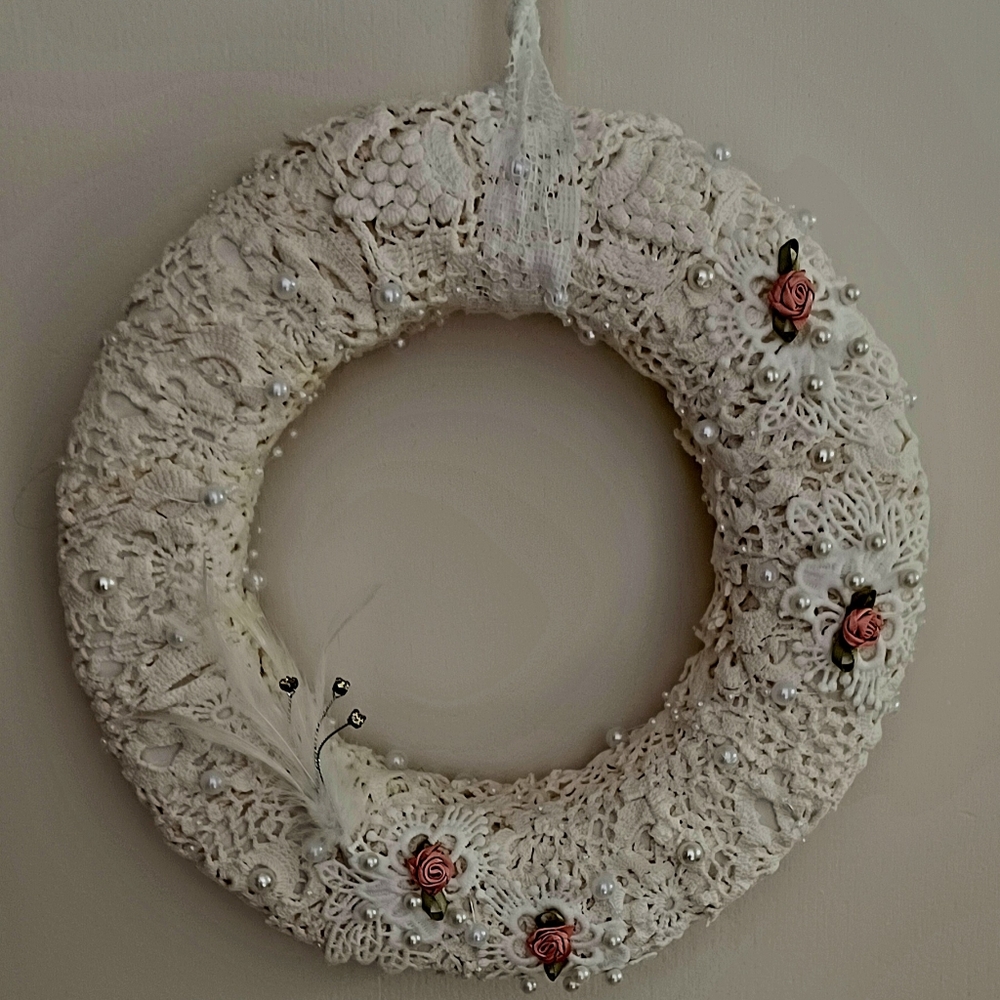 Elegant Lace Wreath with Pink Accents